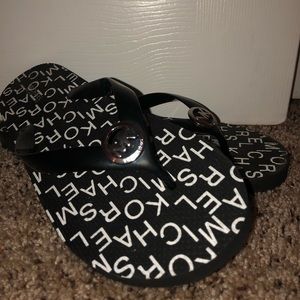 Micheal Kors Black Flip Flops